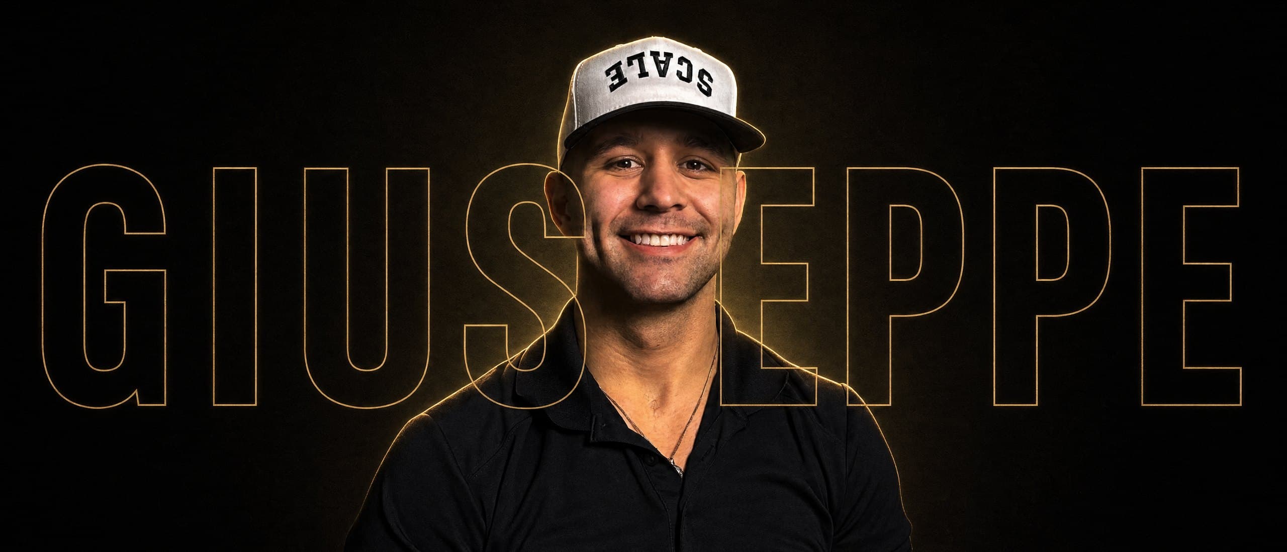 Giuseppe Brown, with his name in gold outlined lettering